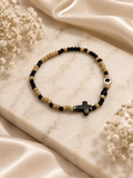 Beaded bracelet with cross and eye