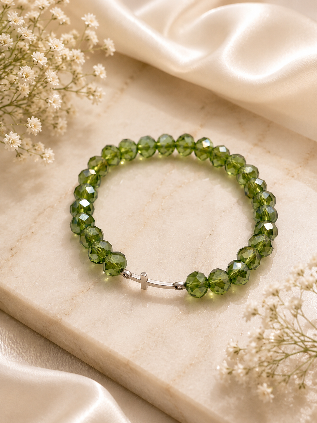 Green spark bracelet with silver cross